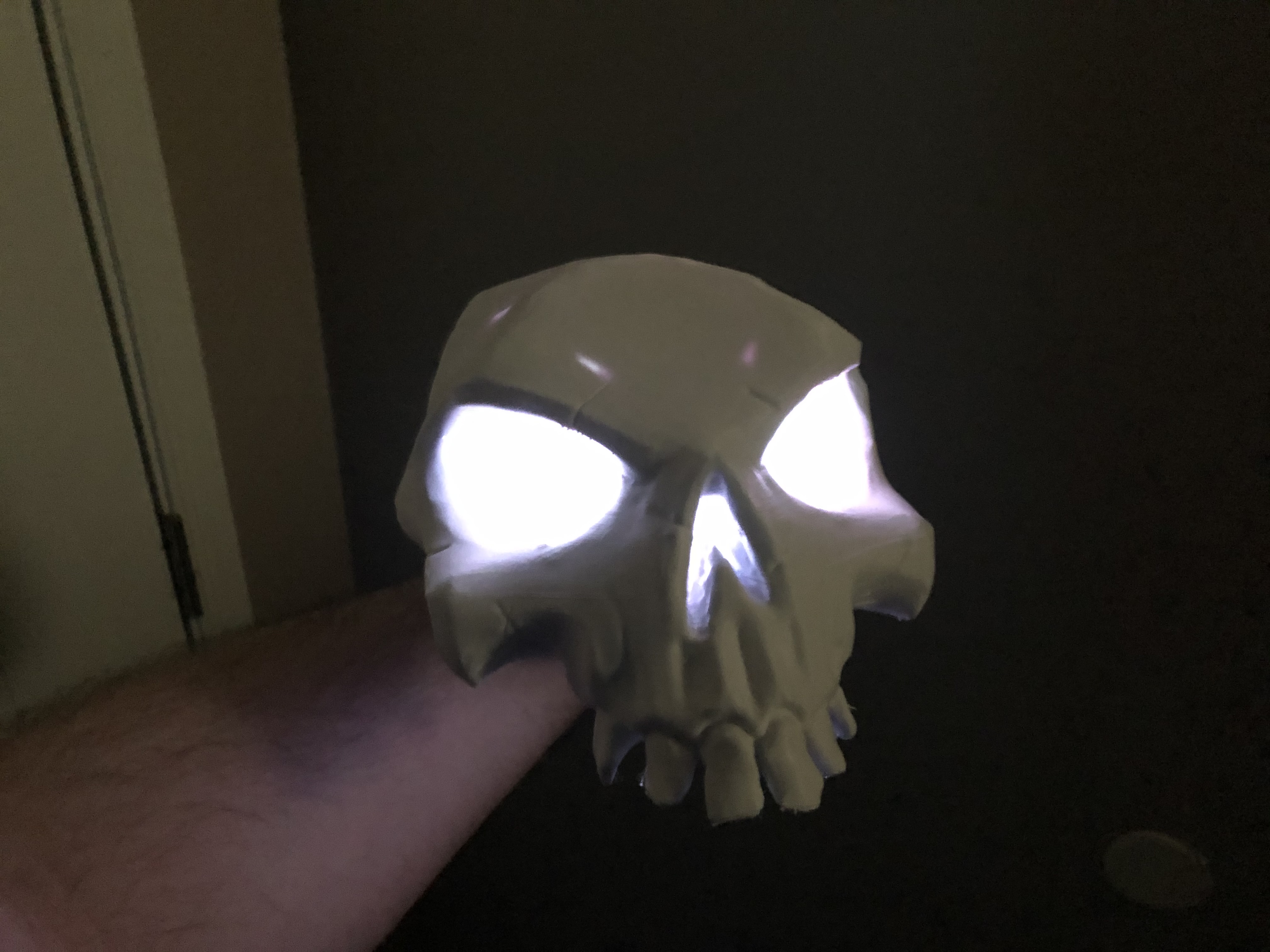 Low-poly glowing skull